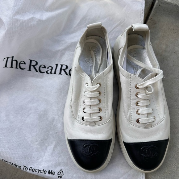 CHANEL Shoes - Chanel White and Black Leather Sneakers